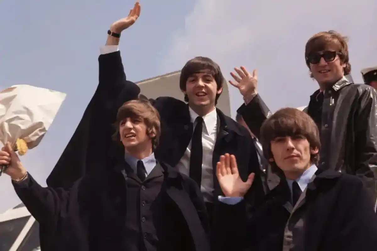 2nd July 1964: The Beatles, John Lennon, George Harrison (1943 - 2001), Paul McCartney and Ringo Starr, pictured on their arrival in London following a tour of Australia.