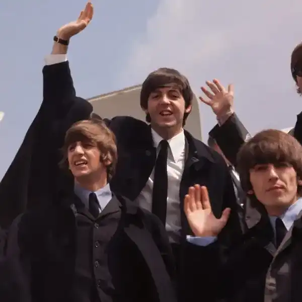 2nd July 1964: The Beatles, John Lennon, George Harrison (1943 - 2001), Paul McCartney and Ringo Starr, pictured on their arrival in London following a tour of Australia.