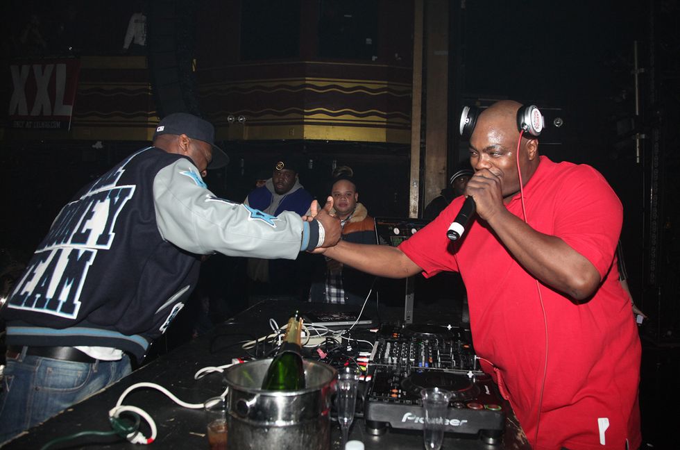 50 Cent and Mister Cee attend the XXL Magazine Year End issue release party at Webster Hall on December 29, 2011 in New York City.