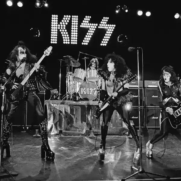 American rock group Kiss perform live on stage at Cobo Hall in Detroit during the concert recording of Alive! on 16th May 1975. Left to right: Gene Simmons, Peter Criss, Paul Stanley and Ace Frehley.