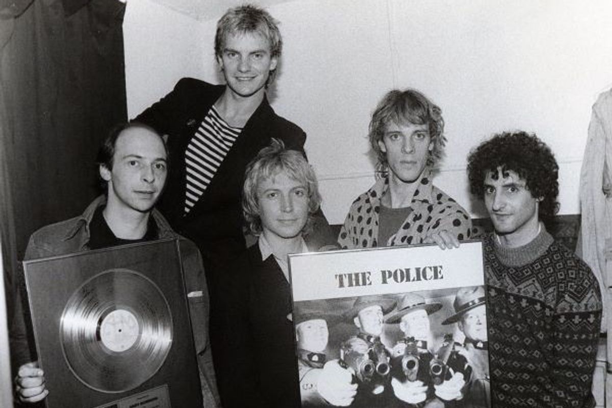 An archival photo of Gary Topp (right) with Sting & The Police and his former promotion partner Gary Cormier (left).