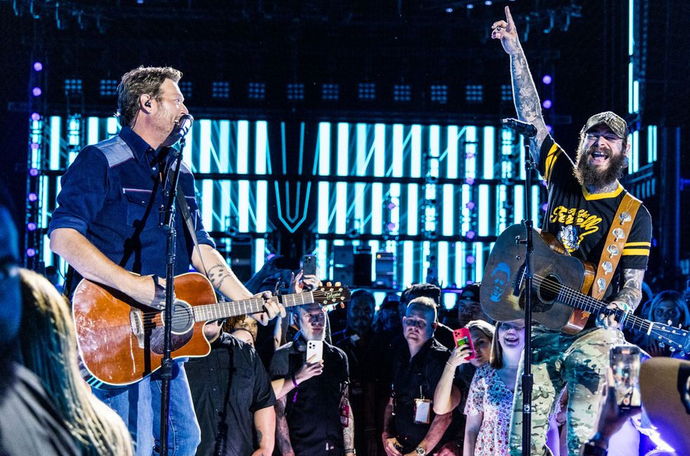 Blake Shelton and Post Malone perform onstage during night one of The 51st CMA Fest at Nissan Stadium on June 06, 2024 in Nashville.