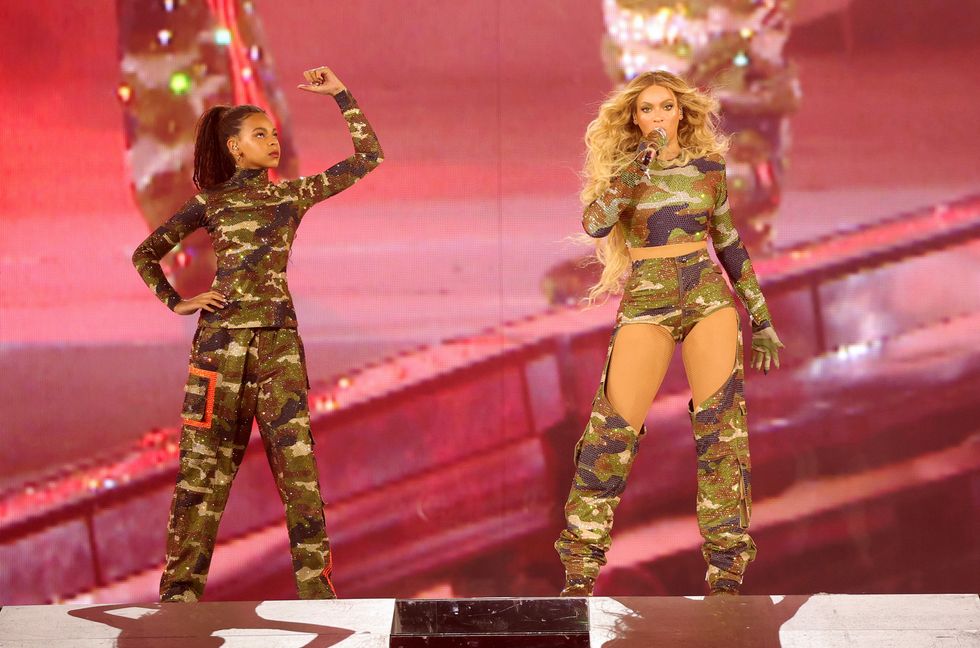 Blue Ive Carter and Beyoncé perform onstage during the "RENAISSANCE WORLD TOUR" at Mercedes-Benz Stadium on Aug. 11, 2023 in Atlanta.