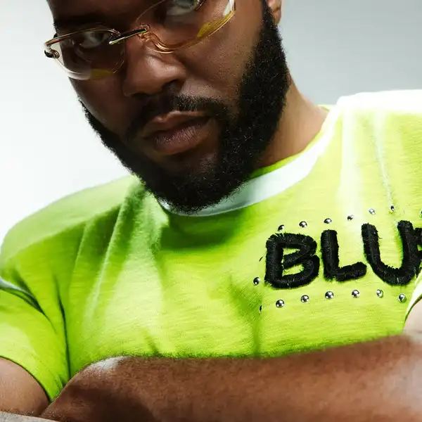 Blue Marble shirt, Bonnie & Clyde glasses.