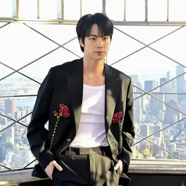 BTS' Jin lights the Empire State Building in celebration of his second solo album, Echo, on May 20, 2025, in New York City.