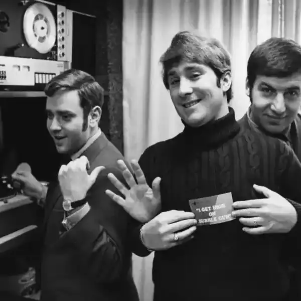 Buddah Records executive Neil Bogart (left) jokes with bubblegum pop producers L-R Jerry Kasenetz and Jeff Katz also called Super K Production Company in his office circa 1968.