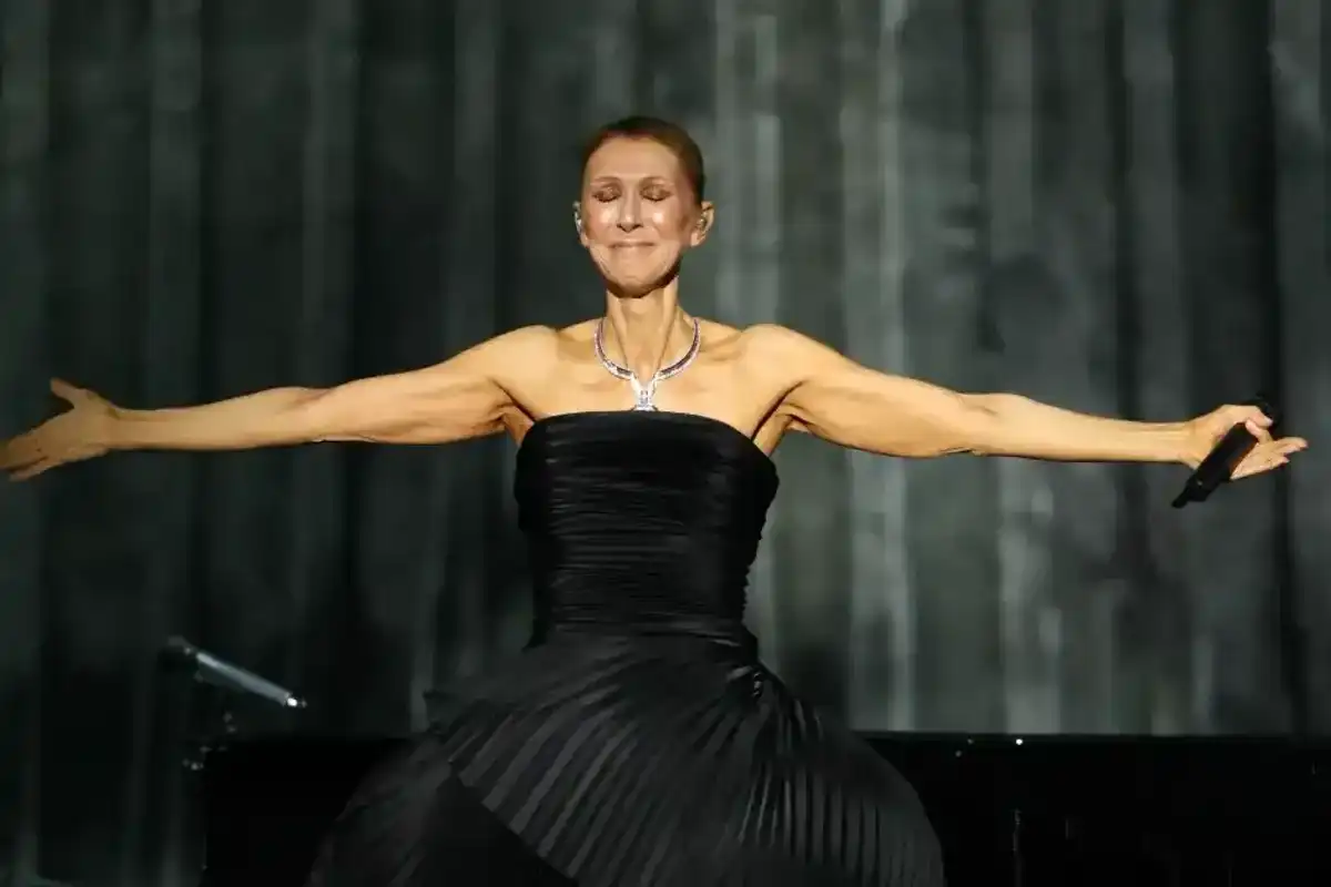 Céline Dion reacts as she performs during her first concert of a series at the Plenitude Arena in Nanterre, west of Paris, on Sept. 12, 2026.