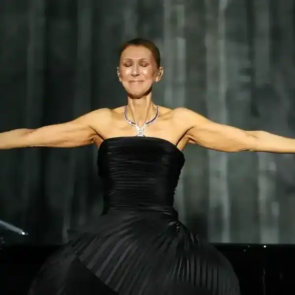 Céline Dion reacts as she performs during her first concert of a series at the Plenitude Arena in Nanterre, west of Paris, on Sept. 12, 2026.