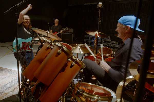 Chad Smith with Geddy Lee and Alex Lifeson of Rush in 'Neil Peart: No One's Disciple'
