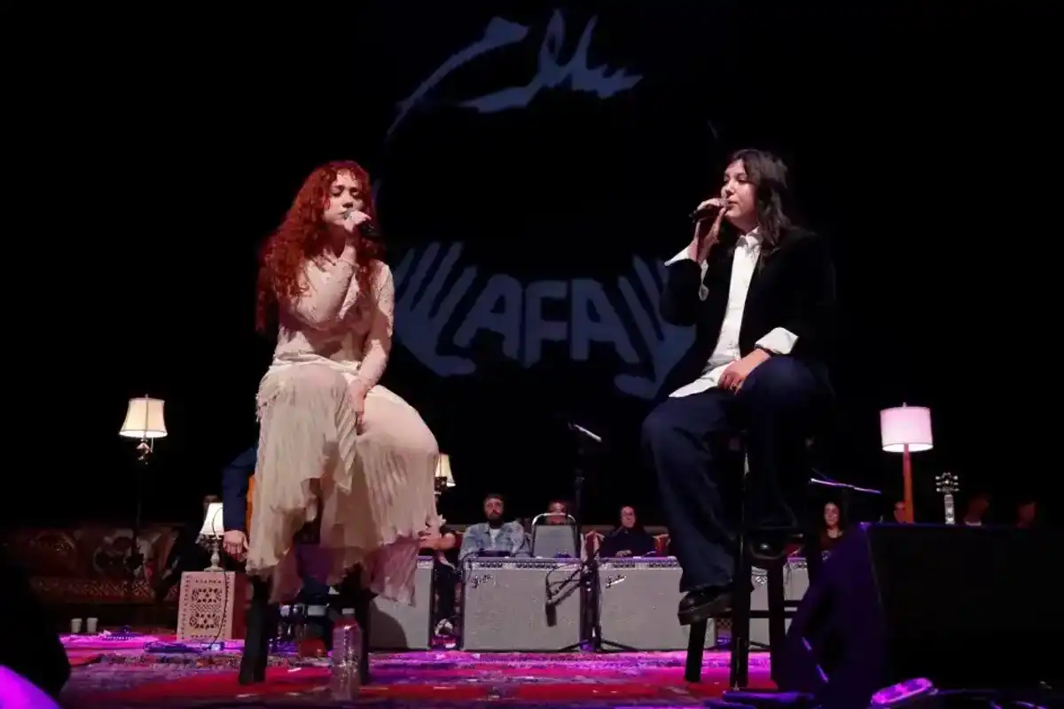 Chappell Roan and Lucy Dacus perform during Artists for Aid at Shrine Auditorium and Expo Hall on January 10, 2026 in Los Angeles.
