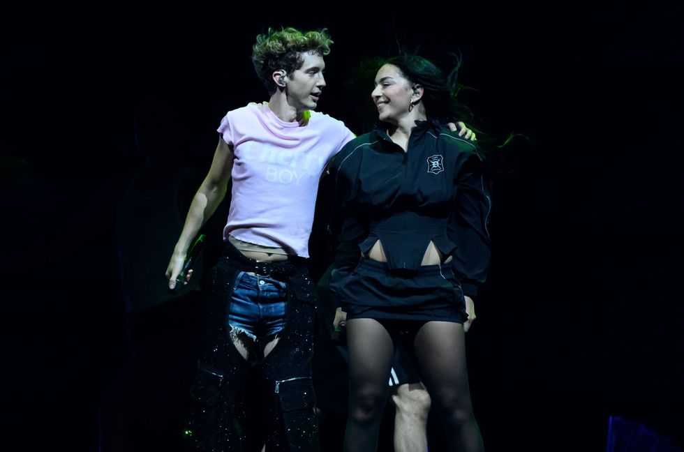 Charli XCX joins Troye Sivan on stage during the Something to Give Each Other Tour at OVO Arena Wembley on June 27, 2024 in London.