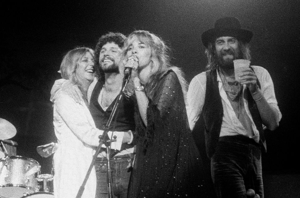 Christine McVie, Lindsey Buckingham, Stevie Nicks, Mick Fleetwood of Fleetwood Mac performing onstage in 1977.