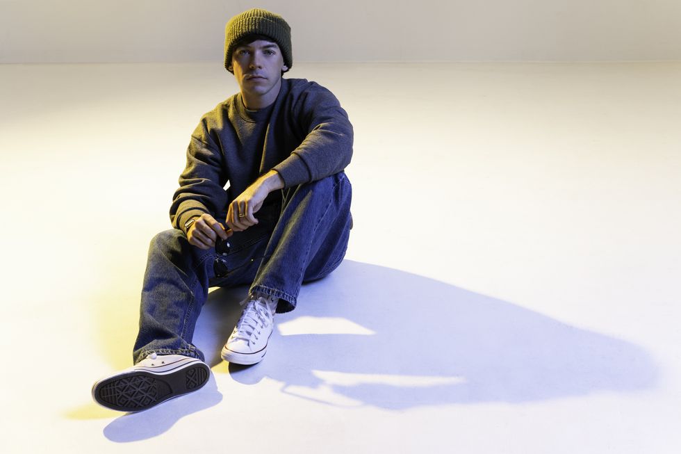 Connor Price photographed by Lane Dorsey on Apr. 2, 2025 in Toronto. Styling by Lilli Wickham and style coordinating by Liam Colbourne. Purple Hearts Supply pants and Converse shoes.