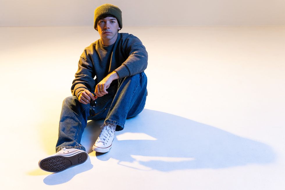 Connor Price photographed by Lane Dorsey on Apr. 2, 2025 in Toronto. Styling by Lilli Wickham and style coordinating by Liam Colbourne. Purple Hearts Supply pants and Converse shoes.