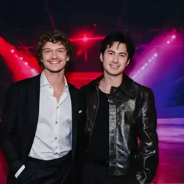 Connor Storrie and Hudson Williams attend the premiere of "Heated Rivalry" at TIFF Lightbox on November 24, 2025 in Toronto, Ontario.