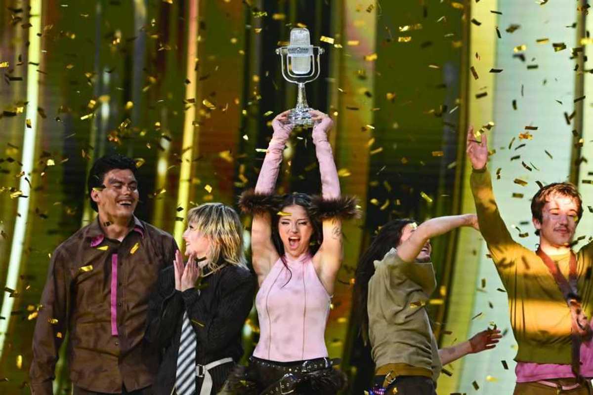 DARA representing Bulgaria with the song "Bangaranga," winner of the Eurovision Song Contest, celebrates on stage while holding the trophy during the Grand Final of the 70th Eurovision Song Contest at Wiener Stadthalle on May 17, 2026 in Vienna, Austria.