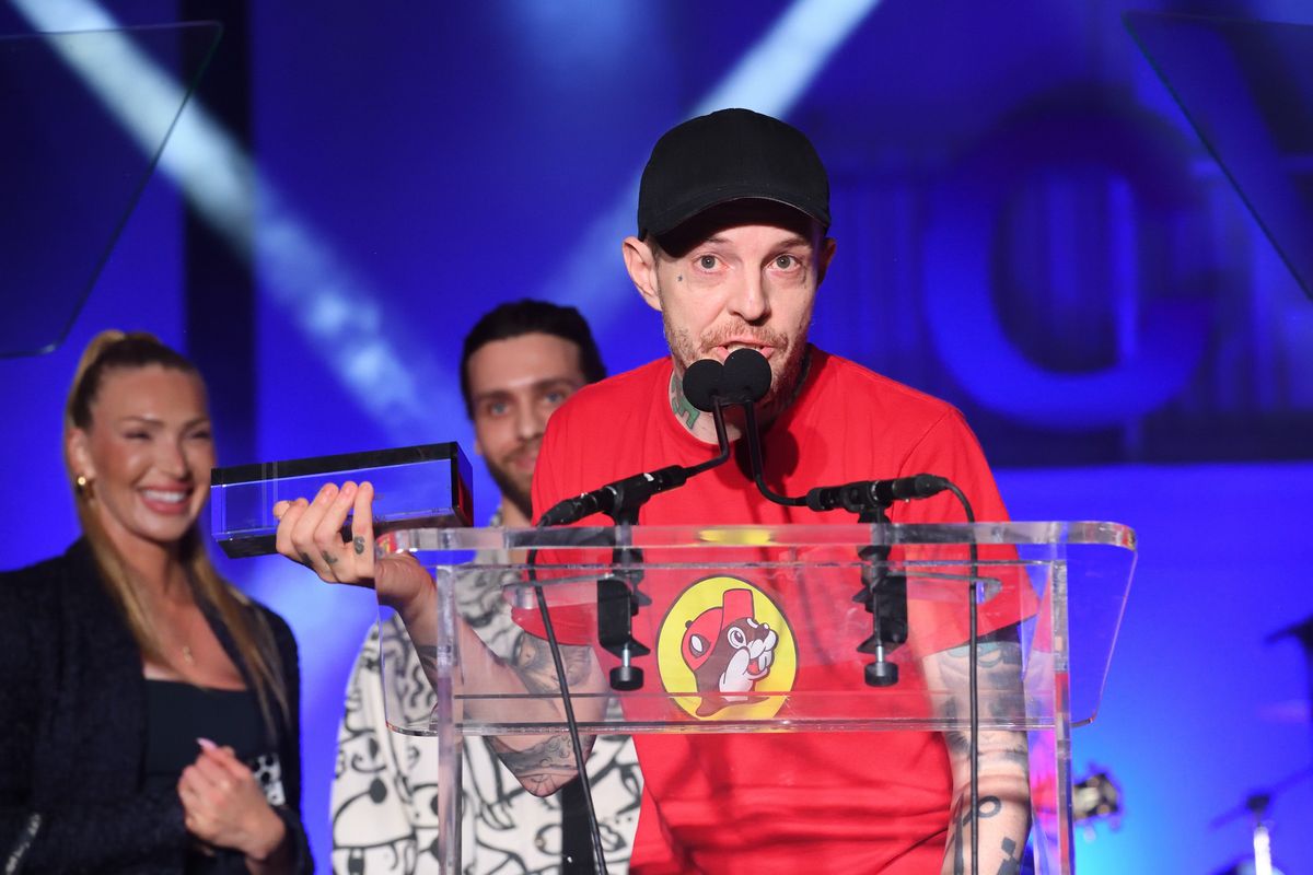 deadmau5 accepts his Canadian Music Industry Hall of Fame Award at CMW 2024 from Billboard Canada CCO Elizabeth Crisante (left) and President Mo Ghoneim