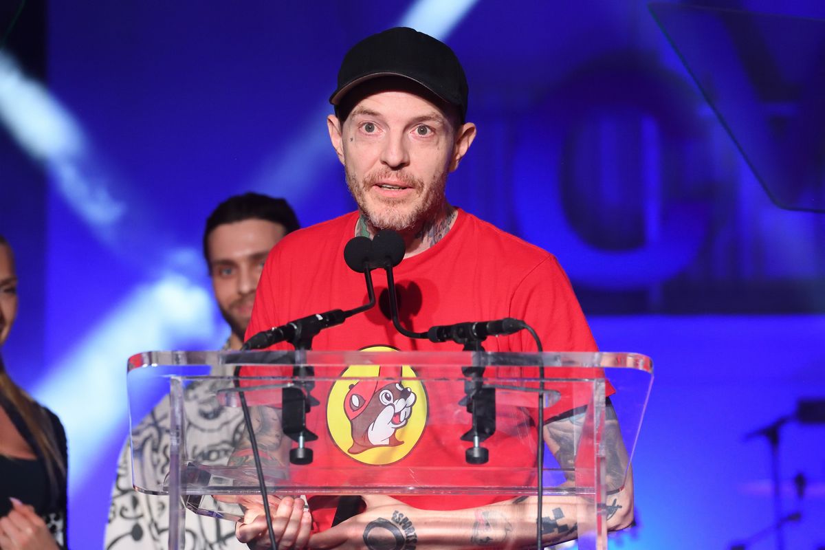 deadmau5 accepts his Canadian Music Industry Hall of Fame Award at CMW 2024 from Billboard Canada CCO Elizabeth Crisante (left) and President Mo Ghoneim
