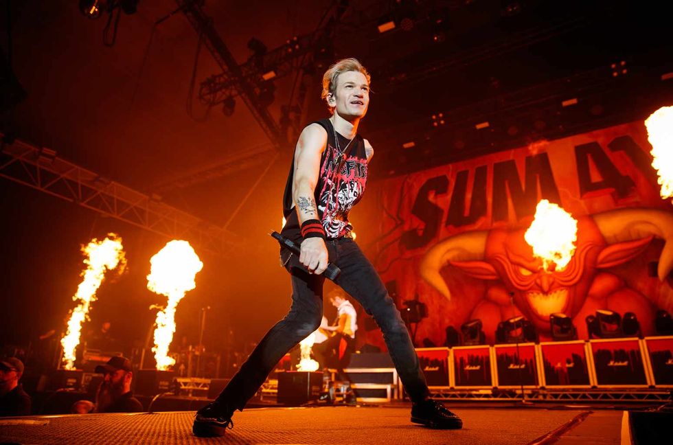 Deryck Whibley of Sum 41 performs during the "Does This Look All Killer No Filler" tour at Alexandra Palace on October 21, 2022 in London.