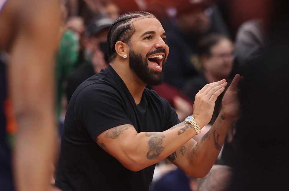 Drake applauds the play on the floor. Toronto Raptors vs Philadelphia 76ers in 1st half action of NBA Playoffs, Round One series at ScotiaBank Arena.