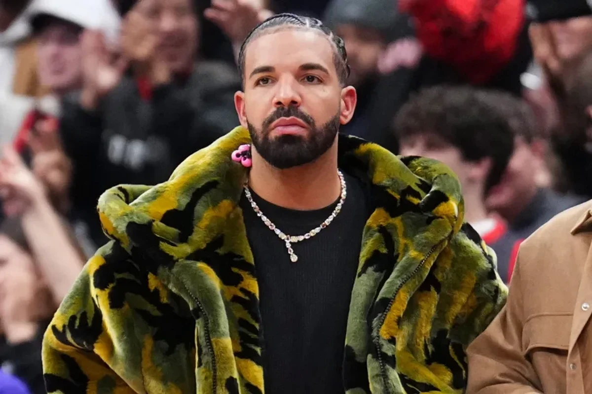 Drake watches on as the Sacramento Kings play the Toronto Raptors during the second half of their basketball game at the Scotiabank Arena on November 2, 2024 in Toronto, Ontario, Canada.