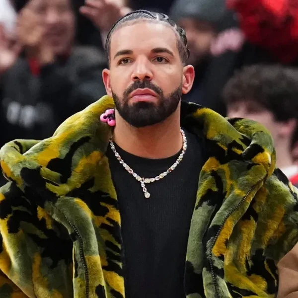 Drake watches on as the Sacramento Kings play the Toronto Raptors during the second half of their basketball game at the Scotiabank Arena on November 2, 2024 in Toronto, Ontario, Canada.
