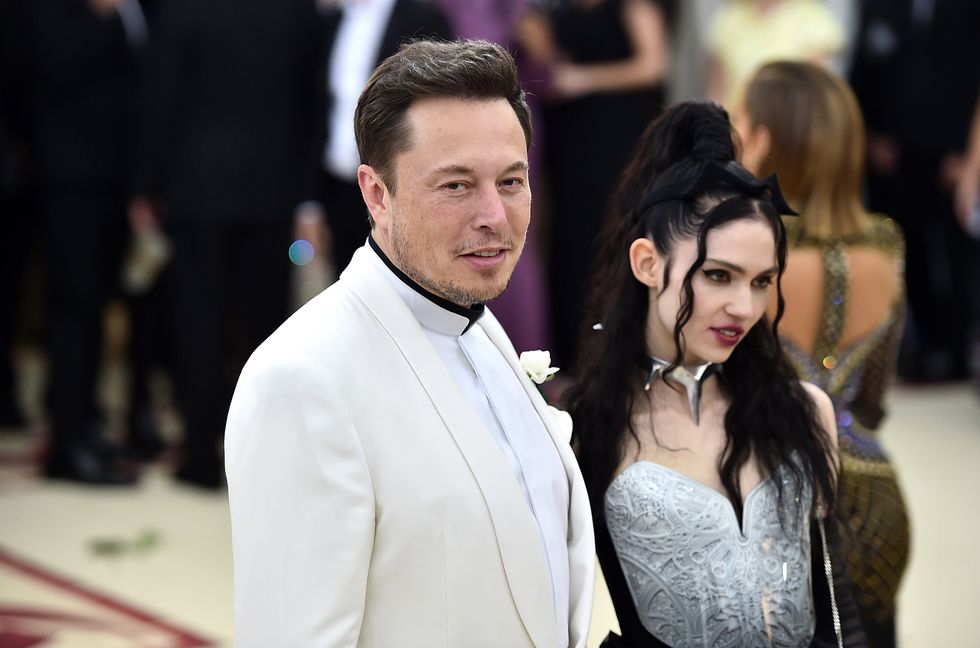 Elon Musk and Grimes attend the Heavenly Bodies: Fashion & The Catholic Imagination Costume Institute Gala at The Metropolitan Museum of Art on May 7, 2018 in New York City.