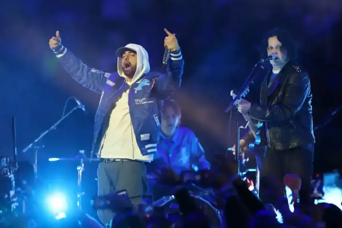 Eminem and Jack White perform during the halftime show of the game between the Green Bay Packers and the Detroit Lions at Ford Field on November 27, 2025 in Detroit, Michigan.