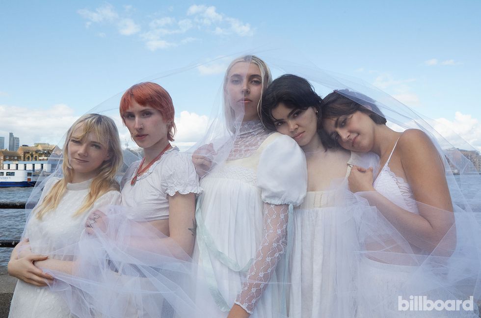 From left: Emily Roberts, Lizzie Mayland, Georgia Davies, Abigail Morris and Aurora Nischevi of The Last Dinner Party photographed on August 30, 2023 in London.