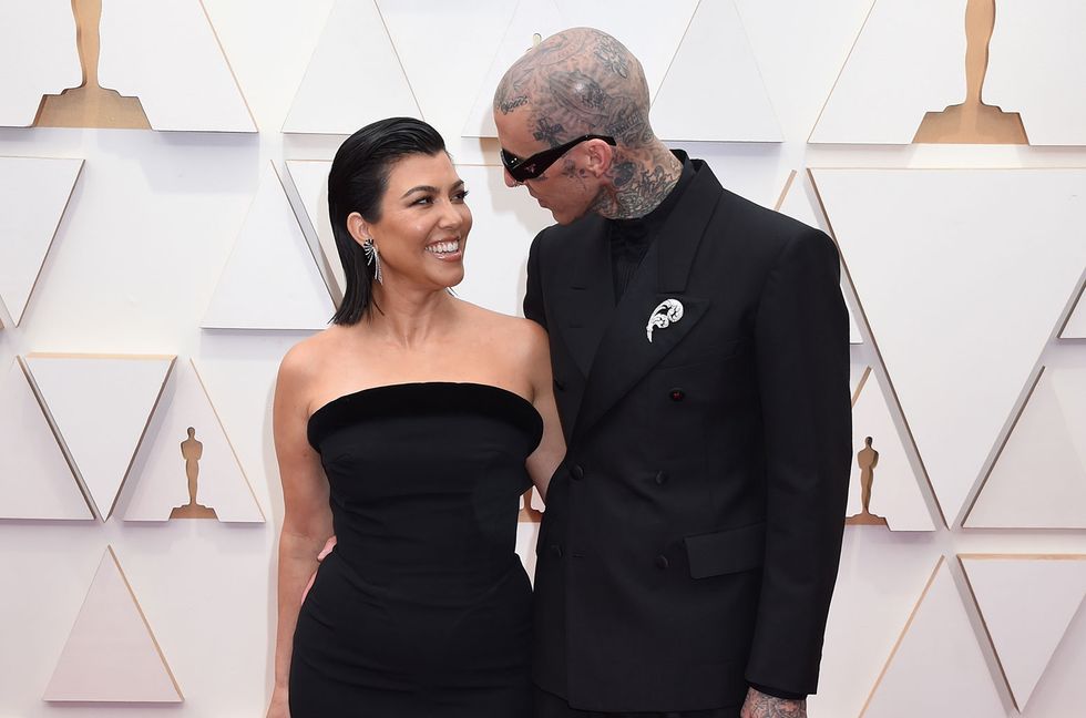 Kourtney Kardashian Shares New Pregnancy Photos & Travis Barker Says They Already Have a Name