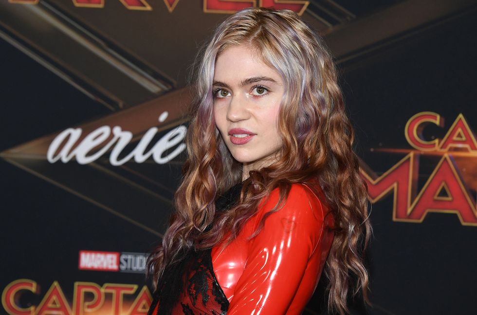 Grimes Shows Off Massive New Leg Tattoo, Says She’s ‘One Step Closer’ to Getting Ink on Her Face