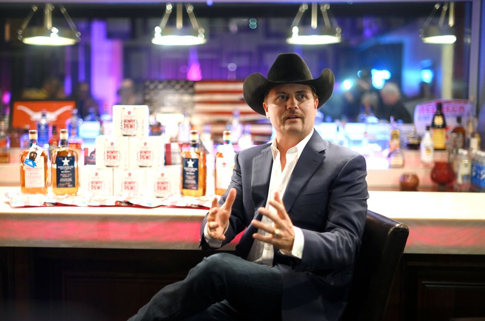 John Rich Removes Bud Light From His Restaurant (And His Bar’s Beer Can Flag) Amid Kid Rock’s Budweiser Boycott