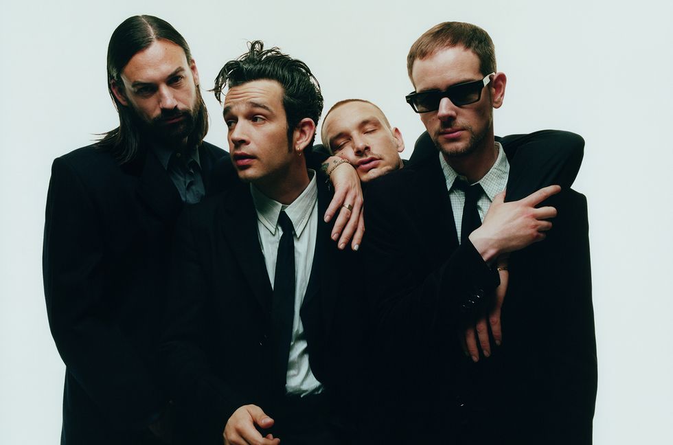 Matty Healy & Ross MacDonald Share a Sweet Kiss During The 1975 Concert: ‘Luckiest Girl in the World’