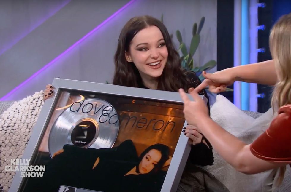 Kelly Clarkson Surprises ‘Emotional’ Dove Cameron With Platinum Award for ‘Boyfriend’