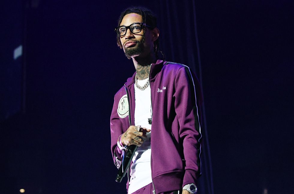 Father, Teenage Son Charged in Killing of Rapper PnB Rock