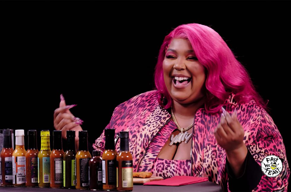 Lizzo Reveals ‘About Damn Time’ Almost Wasn’t a Single, Gets Full Body Shakes Eating Vegan Wings on ‘Hot Ones’: Watch