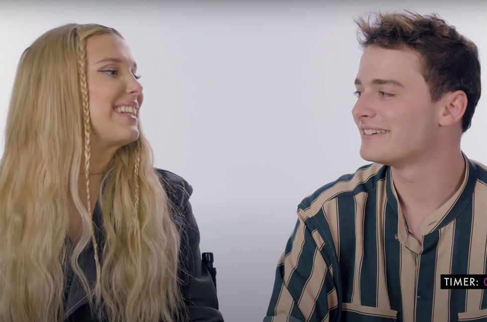 Watch Millie Bobby Brown & Noah Schnapp Try to Sing Kanye West, Eminem & More in ‘Song Association’