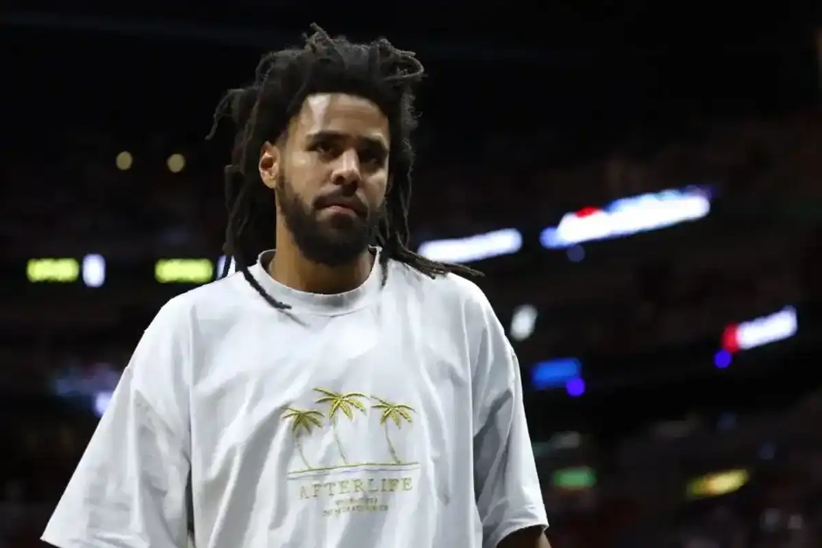 J. Cole is seen in attendance during Game Three of the 2023 NBA Finals between the Denver Nuggets and the Miami Heat at Kaseya Center on June 7, 2023, in Miami.