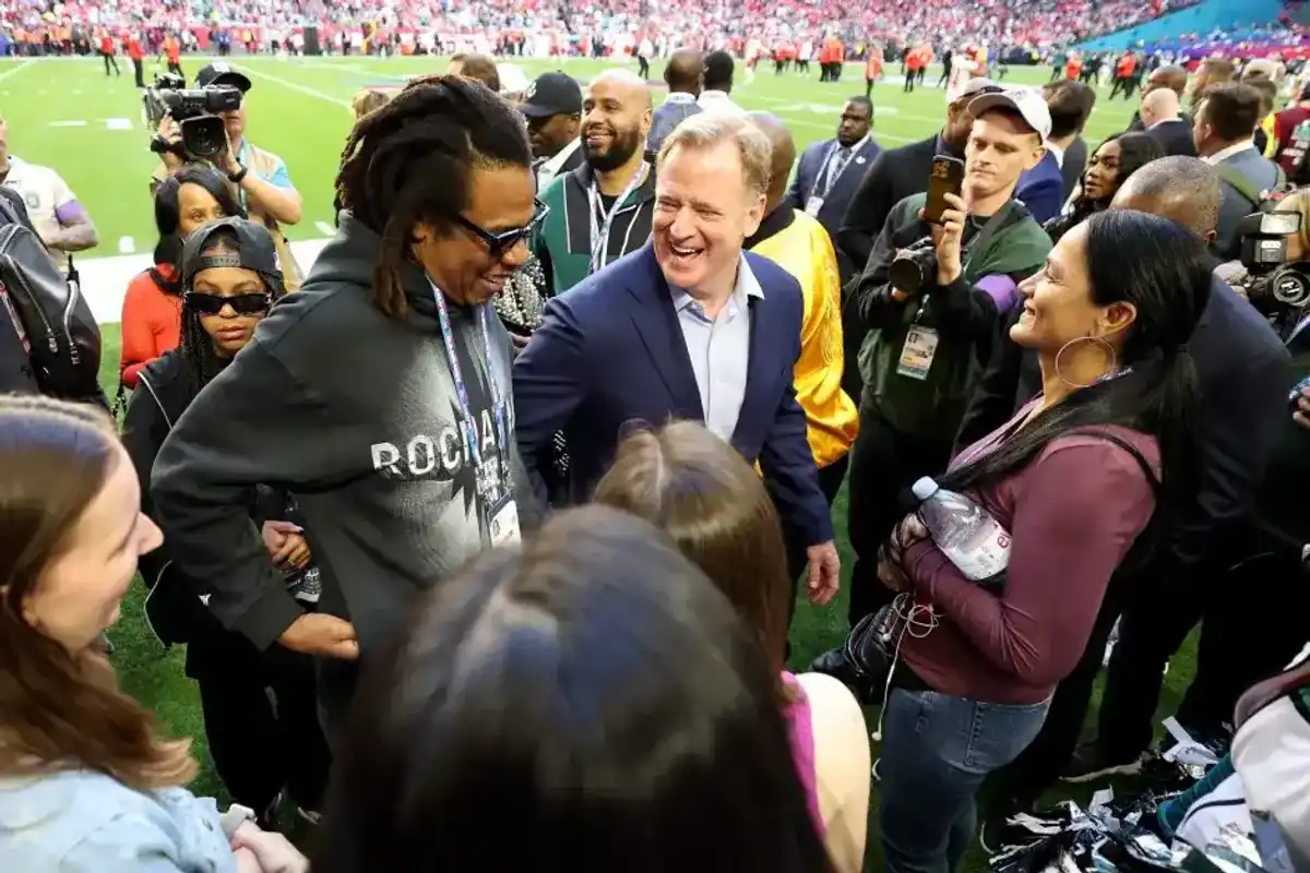 Jay-Z talks with NFL Commissioner Roger Goodell before Super Bowl LVII between the Kansas City Chiefs and the Philadelphia Eagles at State Farm Stadium on Feb. 12, 2023, in Glendale, Ariz.