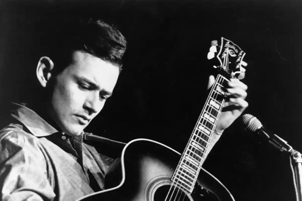 Jesse Colin Young performing onstage for Mercury Records with a Guild acoustic guitar in circa 1965.