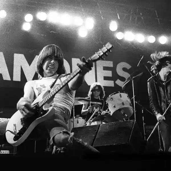 Johnny, Tommy and Joey Ramone of the Ramones perform on stage in the late 1970s.