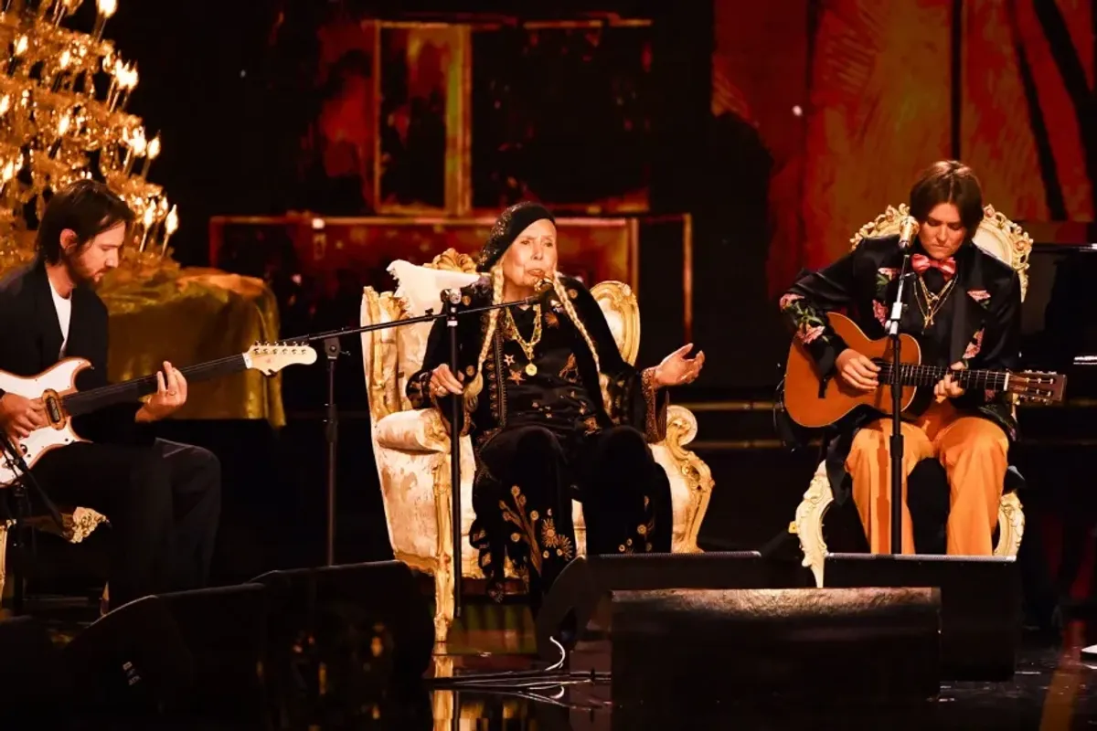 Joni Mitchell (C) and US singer-songwriter Brandi Carlile (R) perform on stage during the 66th Annual Grammy Awards at the Crypto.com Arena in Los Angeles on Feb. 4, 2024.