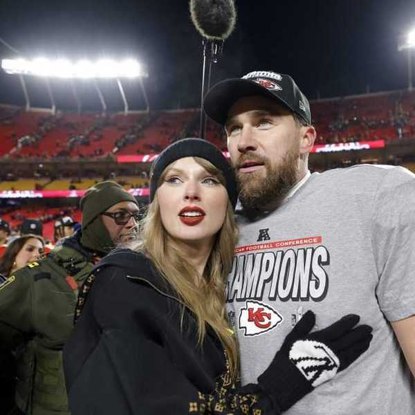 KANSAS CITY, MISSOURI - JANUARY 26: Taylor Swift celebrates with Travis Kelce #87 of the Kansas City Chiefs after defeating the Buffalo Bills 32-29 in the AFC Championship Game at GEHA Field at Arrowhead Stadium on Jan. 26, 2025, in Kansas City.