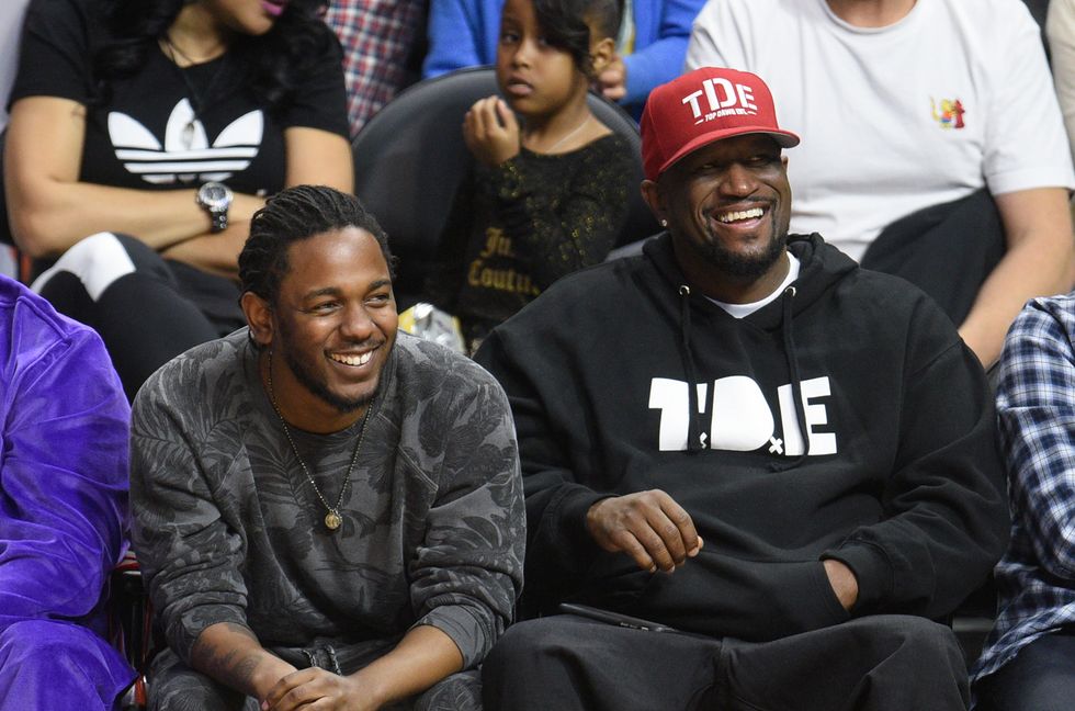 Kendrick Lamar and Anthony Tiffith attend a basketball game between the Cleveland Cavaliers and the Los Angeles Clippers at Staples Center on March 13, 2016 in Los Angeles.