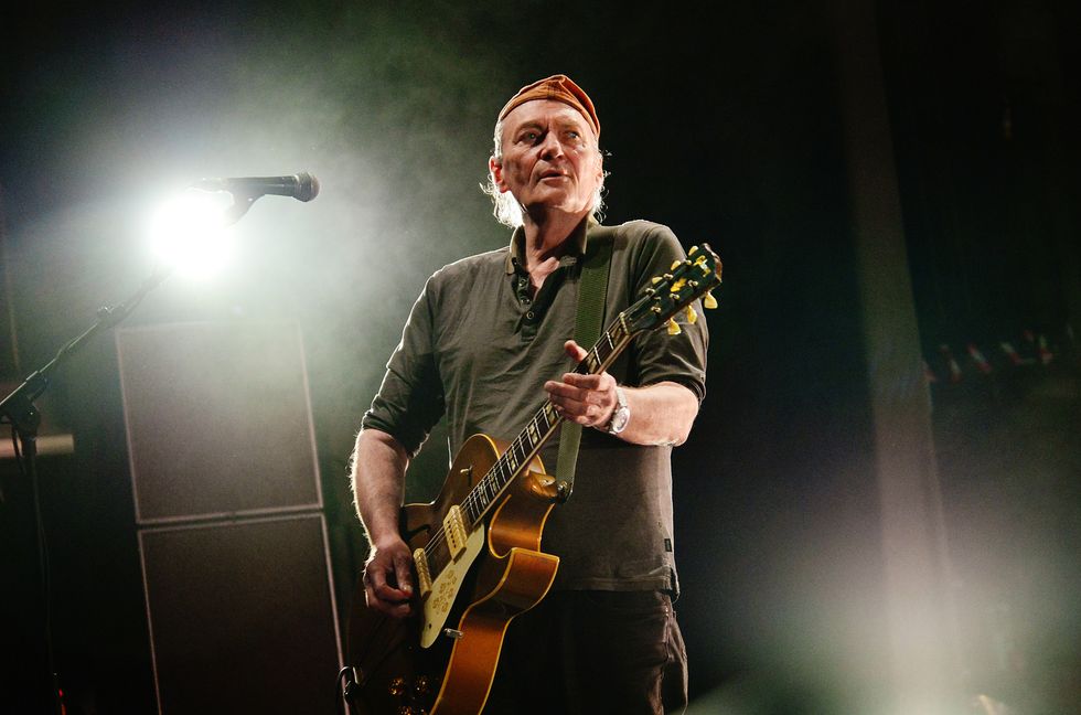 Kevin 'Geordie' Walker of Killing Joke performs at Hammersmith Apollo on April 9, 2022 in London.