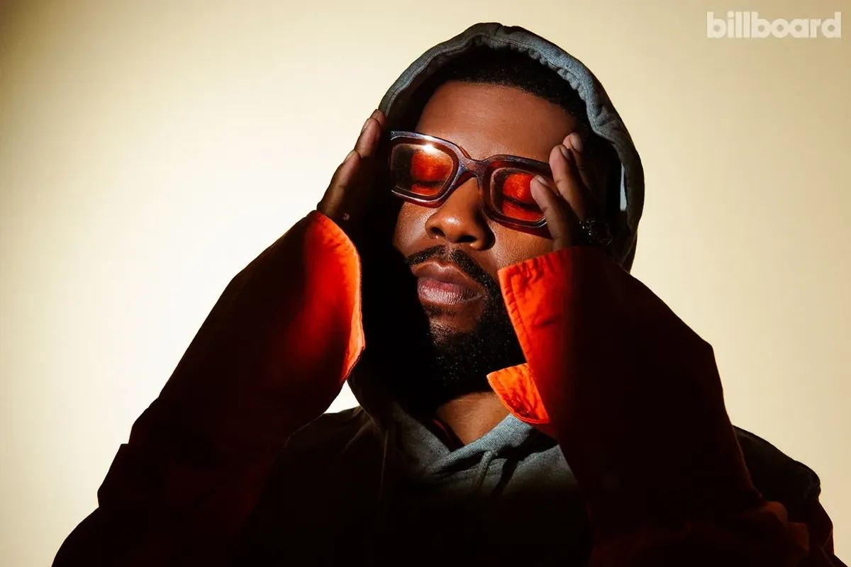 Khalid photographed by Joelle Grace Taylor on April 28, 2025 at Hype Studios in Los Angeles. Styling by Aaron Cristmon and Marquise Miller. Grooming by Jenn Hanching. Manicure by Jessica Dresser. Tailoring by Karina Cardona. Blue Marble hoodie and shirt, Yordy rings, Bonnie & Clyde glasses.