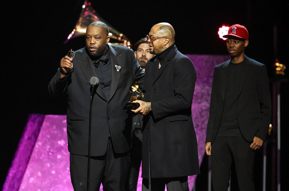 Killer Mike and DJ Paul accept the "Best Rap Song" award for "Scientists & Engineers" onstage at the 66th Annual GRAMMY Awards Premiere Ceremony held at Peacock Theater on February 4, 2024 in Los Angeles, California.