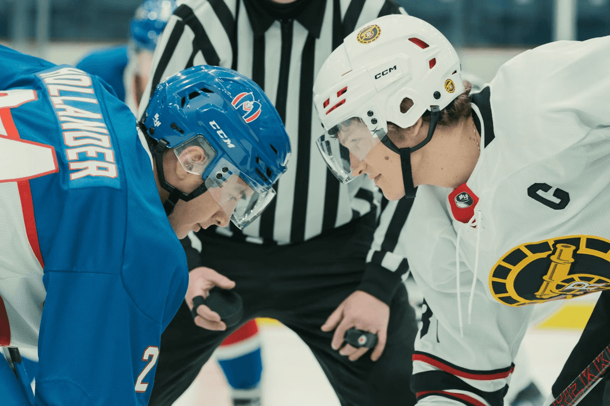 (L-R): Hudson Williams as Shane Hollander and Connor Storrie as Ilya Rozanov in Episode 104 of Heated Rivalry.