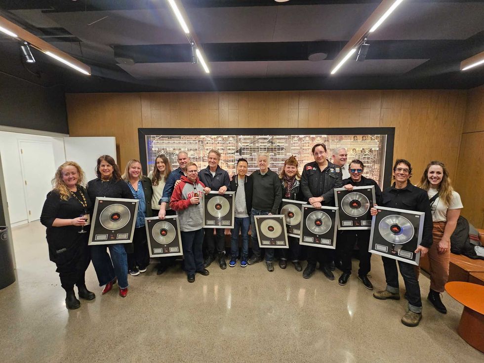L-R: Jude Coombe, Susan de Cartier (Blue Rodeo - manager), Madelaine Napoleone, Julia Hummel, Colin Cripps (Blue Rodeo), Ken Boyer, Jim Cuddy (Blue Rodeo), Eric Wong, Greg Keelor (Blue Rodeo), Jim Bowskill, Michael Boguski (Blue Rodeo), Dave Stelling, Bazil Donovan (Blue Rodeo), Glenn Milchem ( (Blue Rodeo), Danelle Schiele