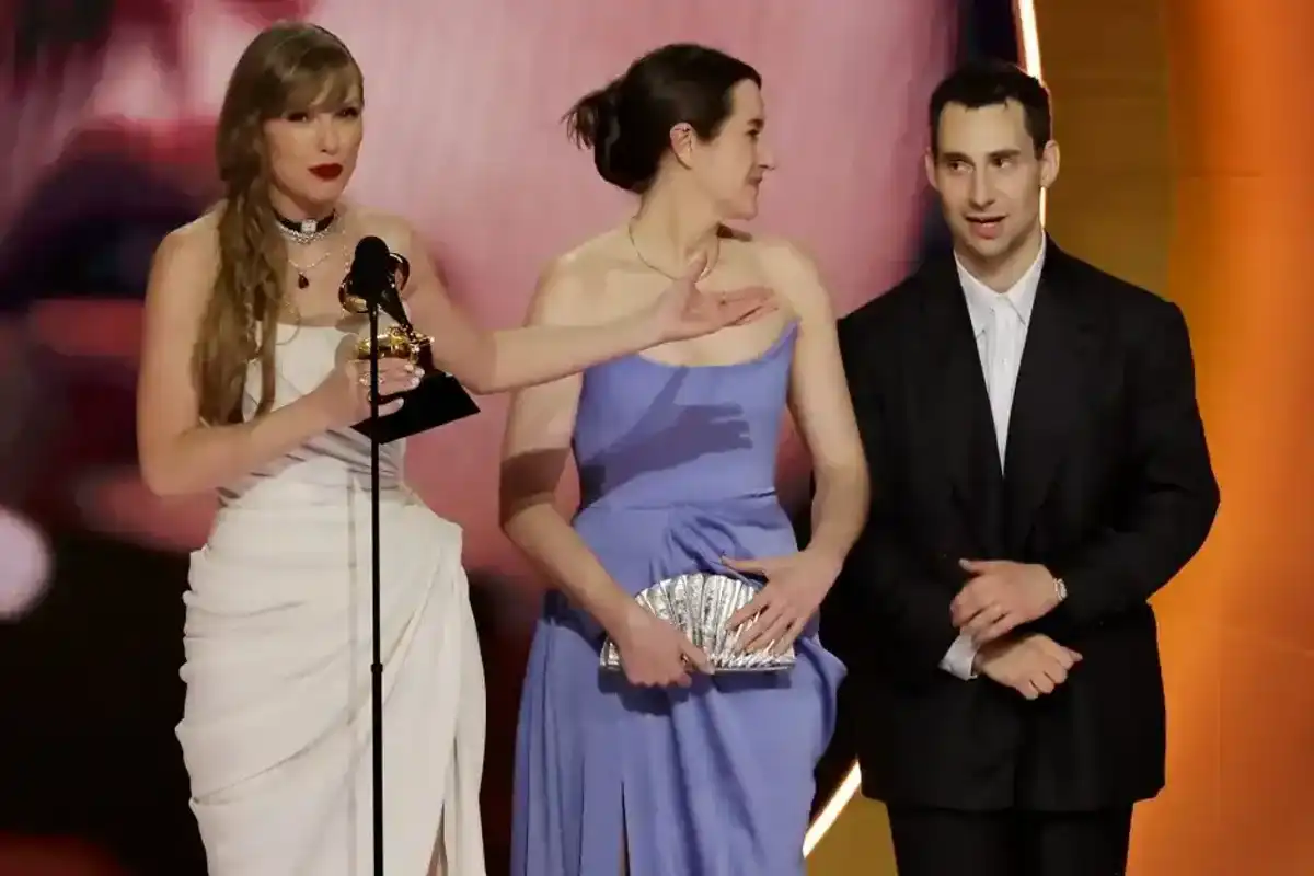 (L-R) Taylor Swift, Laura Sisk, and Jack Antonoff accept the Album Of The Year award for “Midnights” onstage during the 66th GRAMMY Awards at Crypto.com Arena on February 04, 2024 in Los Angeles, California.